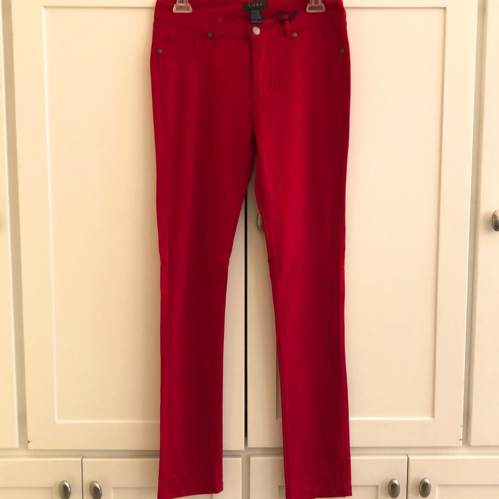Size L Red stretchy skinny pants never worn